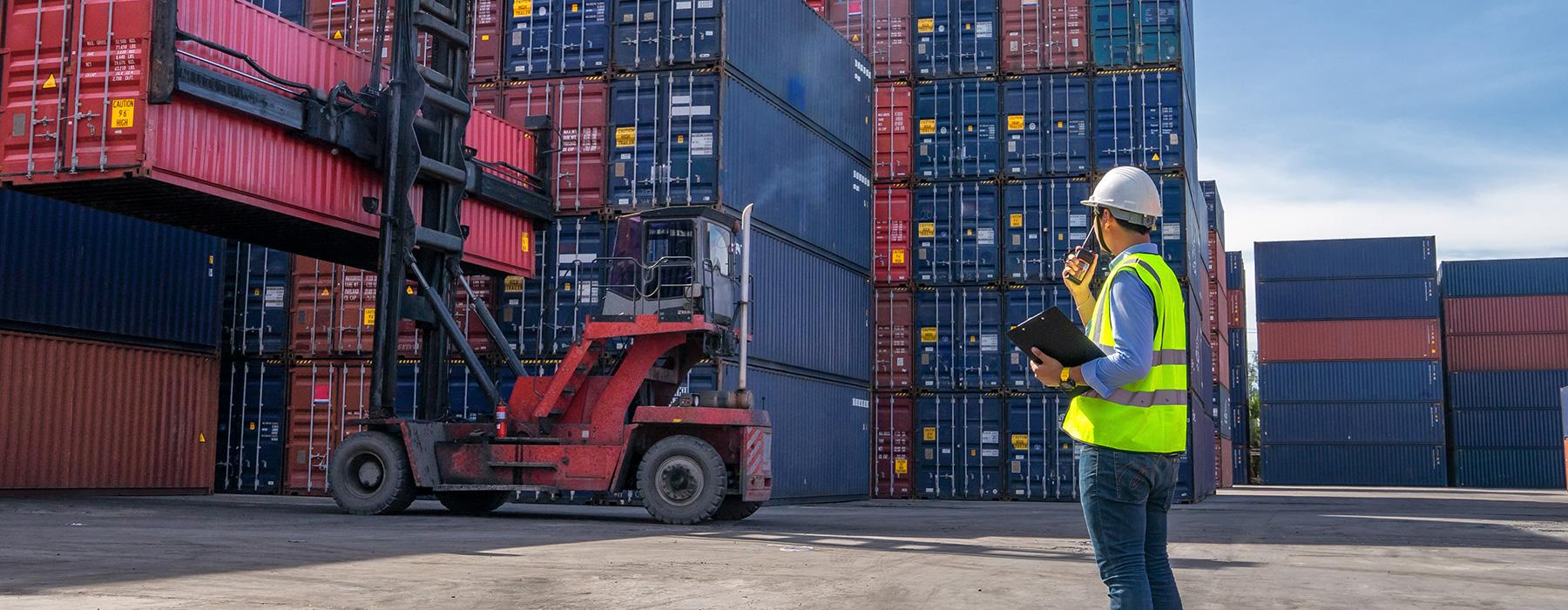 Image of containers with forklift truck