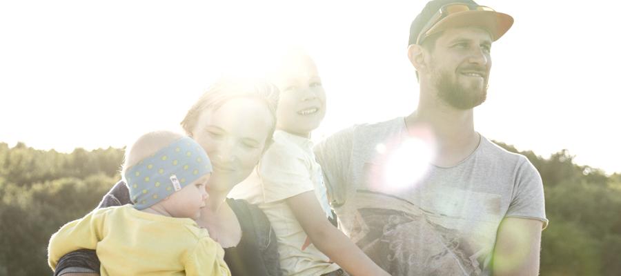 Parents with children in their arms